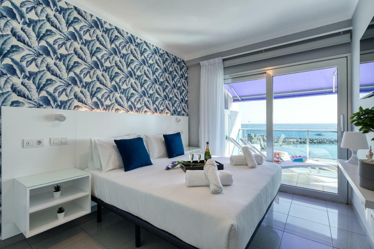 Teresita Mogamar Beachfront Пуэрто-де-Моган Экстерьер фото